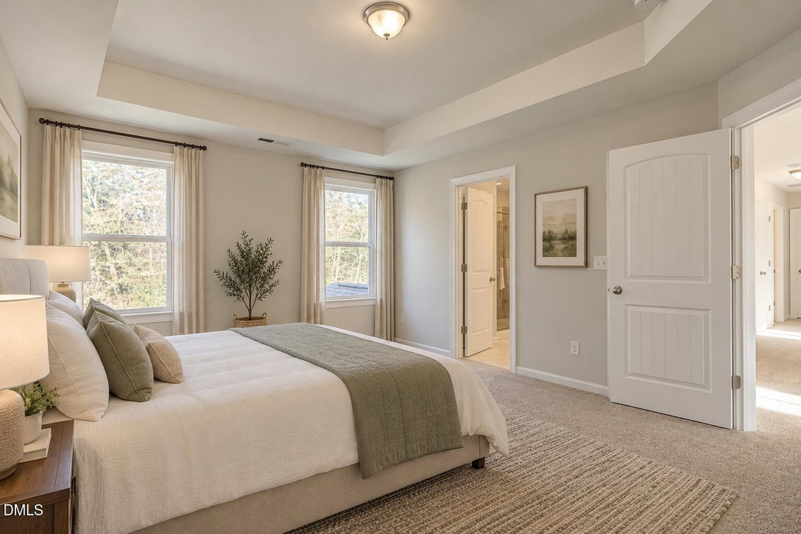 Warm neutral primary bedroom retreat-4