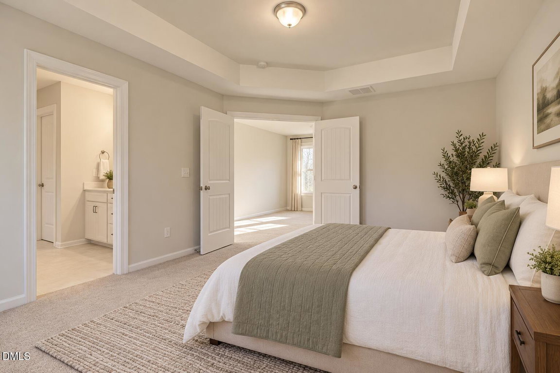 Warm neutral primary bedroom rendering-1