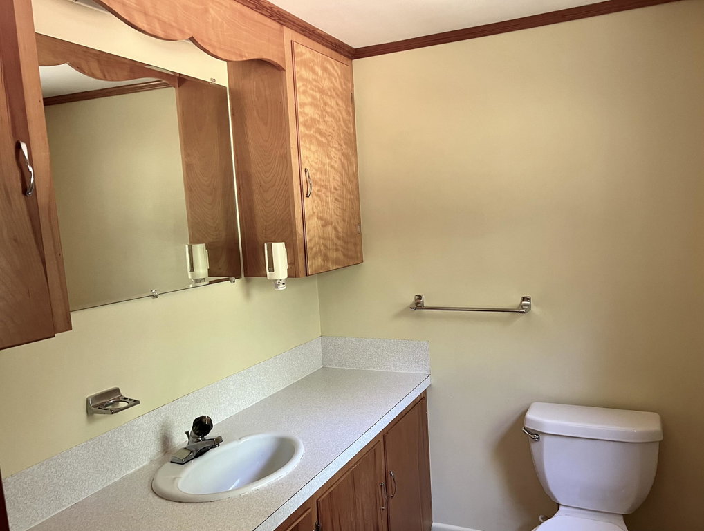 Half bath off of the primary bedroom