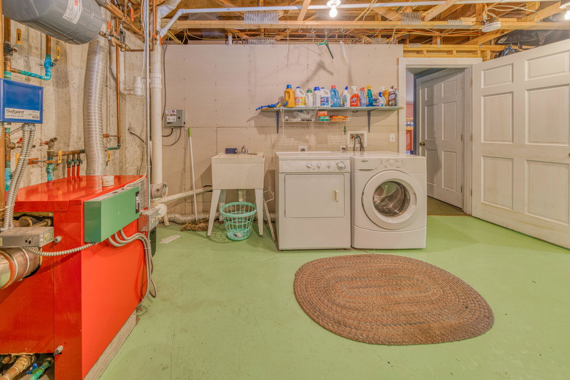 Lower level utility area with washer and