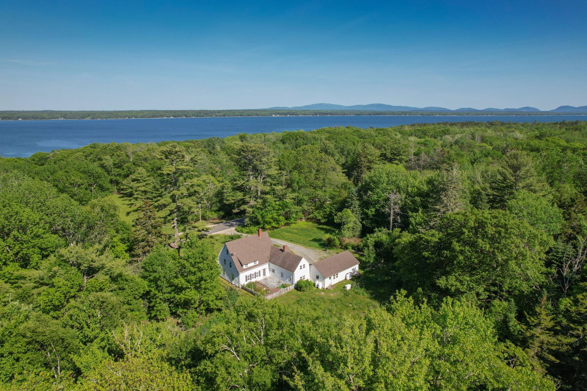 Aerial view of house & property.