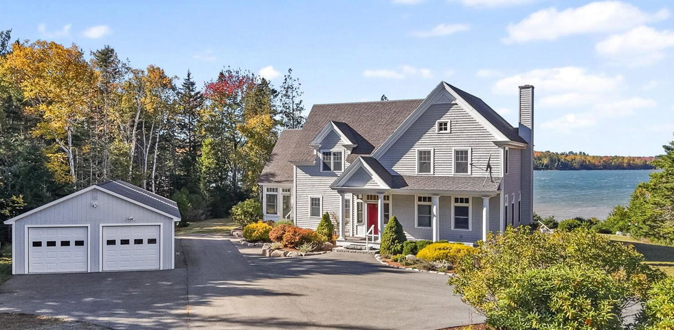 Custom-built home &amp; 3 bay garage on 10.47 acres with 874.9' Shore frontage on Grand Marsh Bay