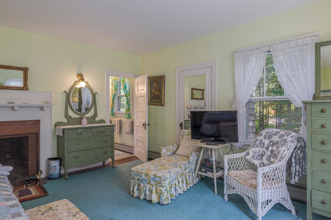 2nd floor bedroom with fireplace