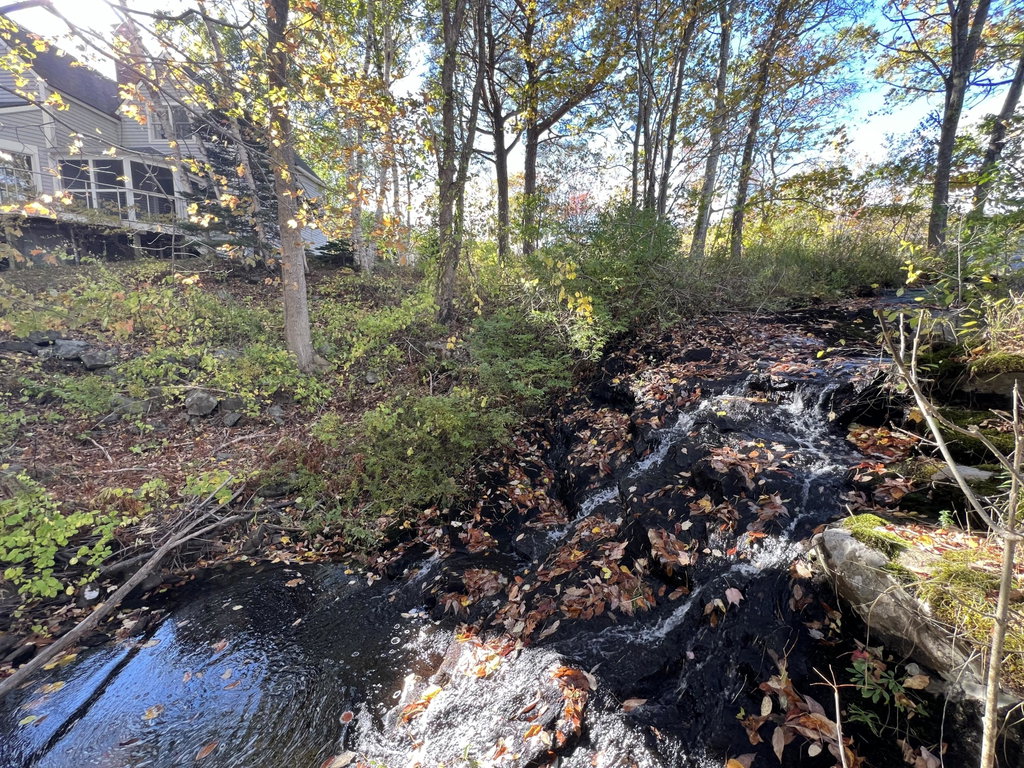waterfall with house