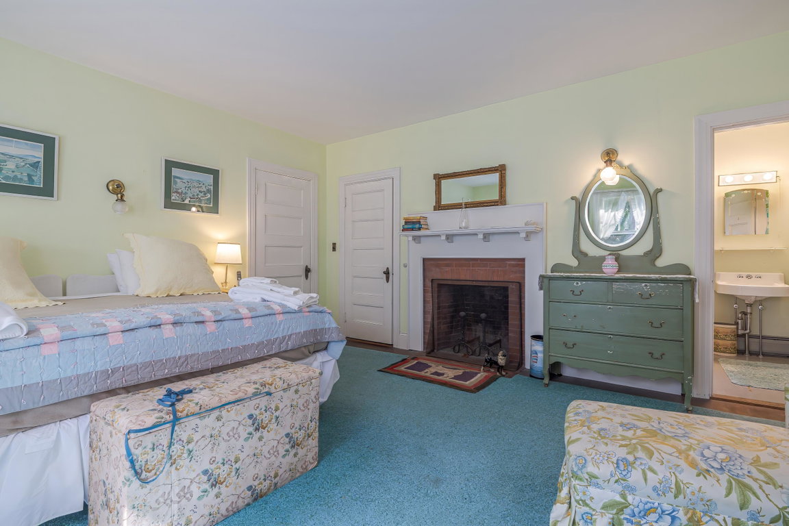 2nd floor bedroom with fireplace