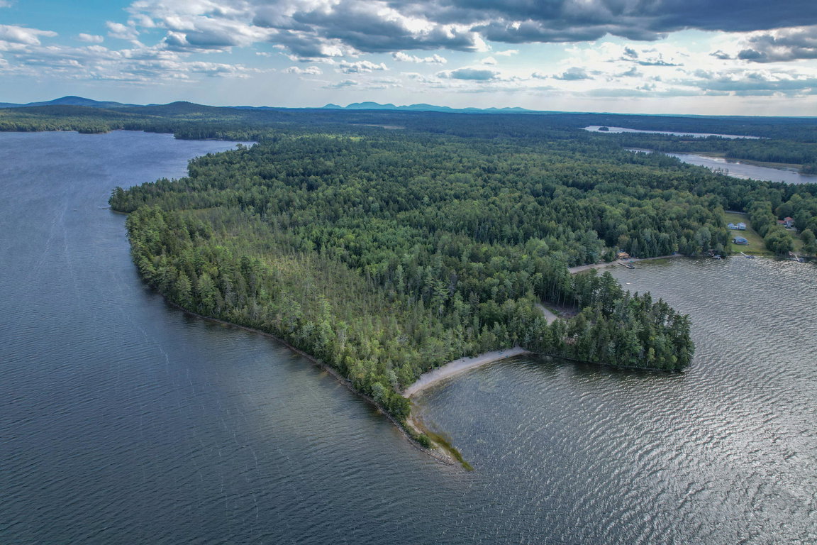 View of beach on Molasses Pond