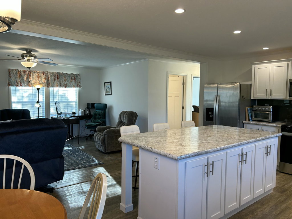 LIVING ROOM AS SEEN FROM THE DINING AREA