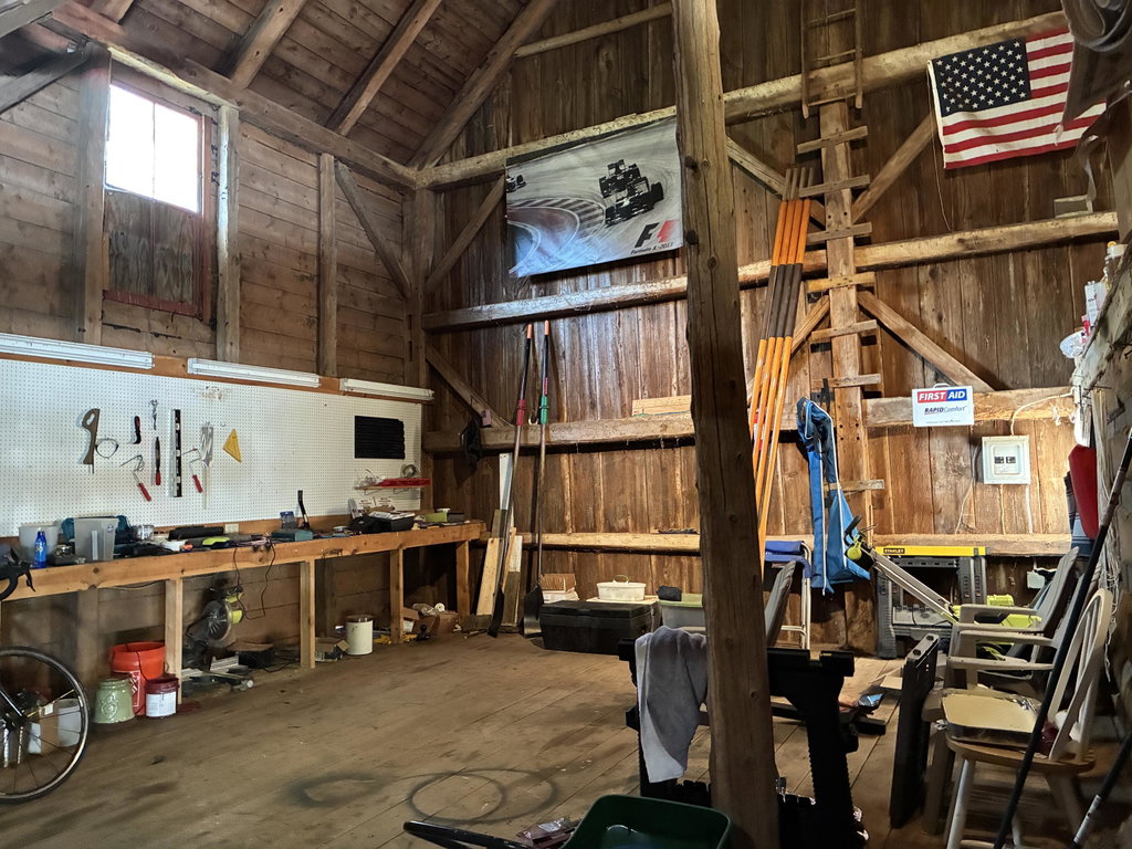 Workshop space in barn open to peak.
