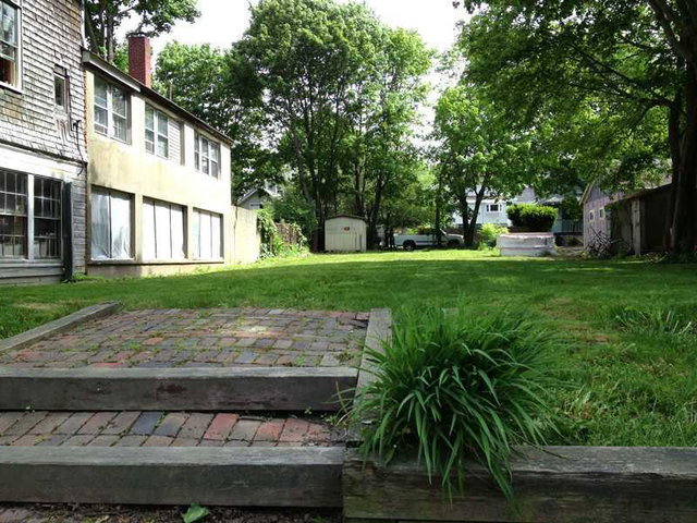Land/Lot. From Cottage Street looking towards the back of property