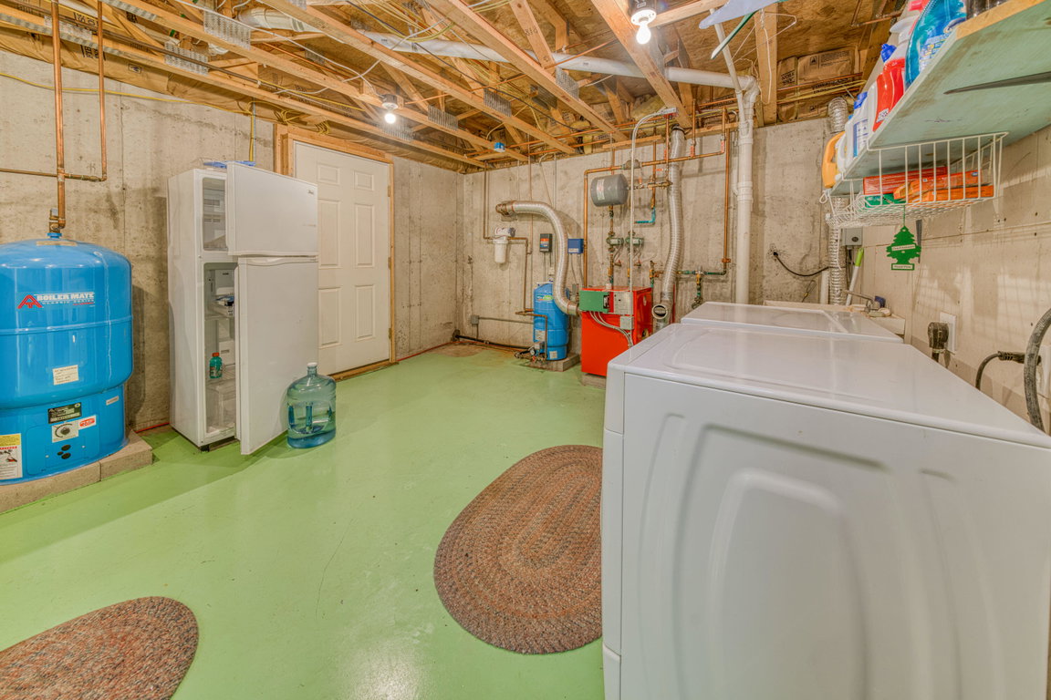 Lower level utility area with washer and