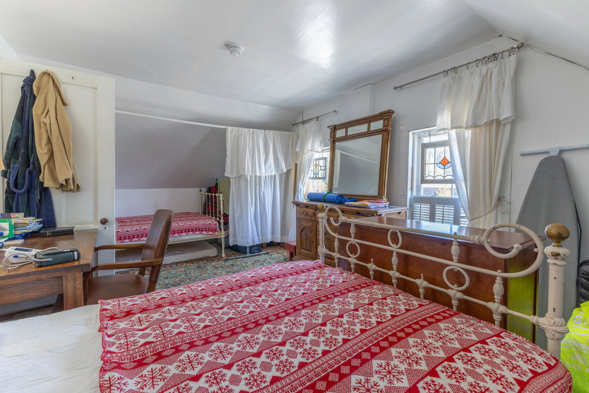 Alove sleep space under eaves.