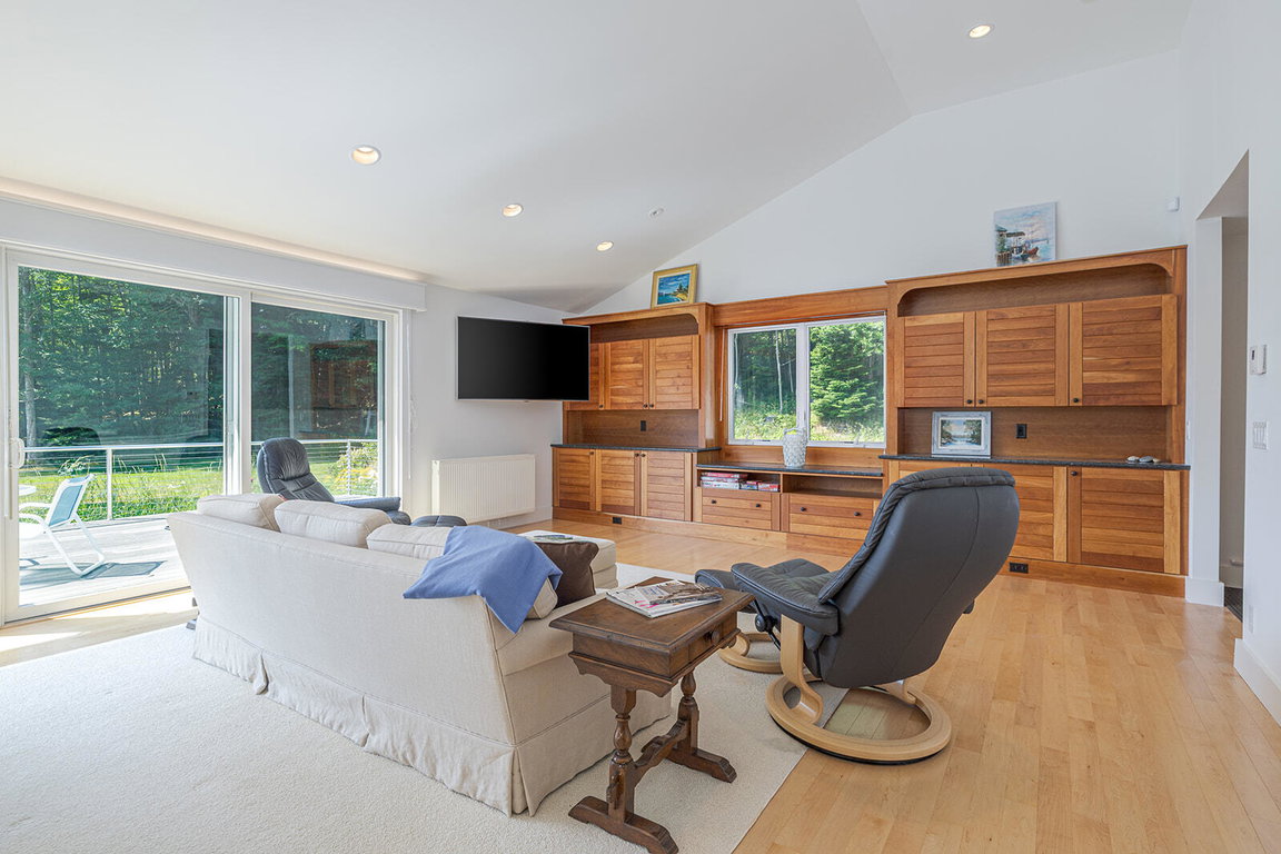 Living room with doors to the deck