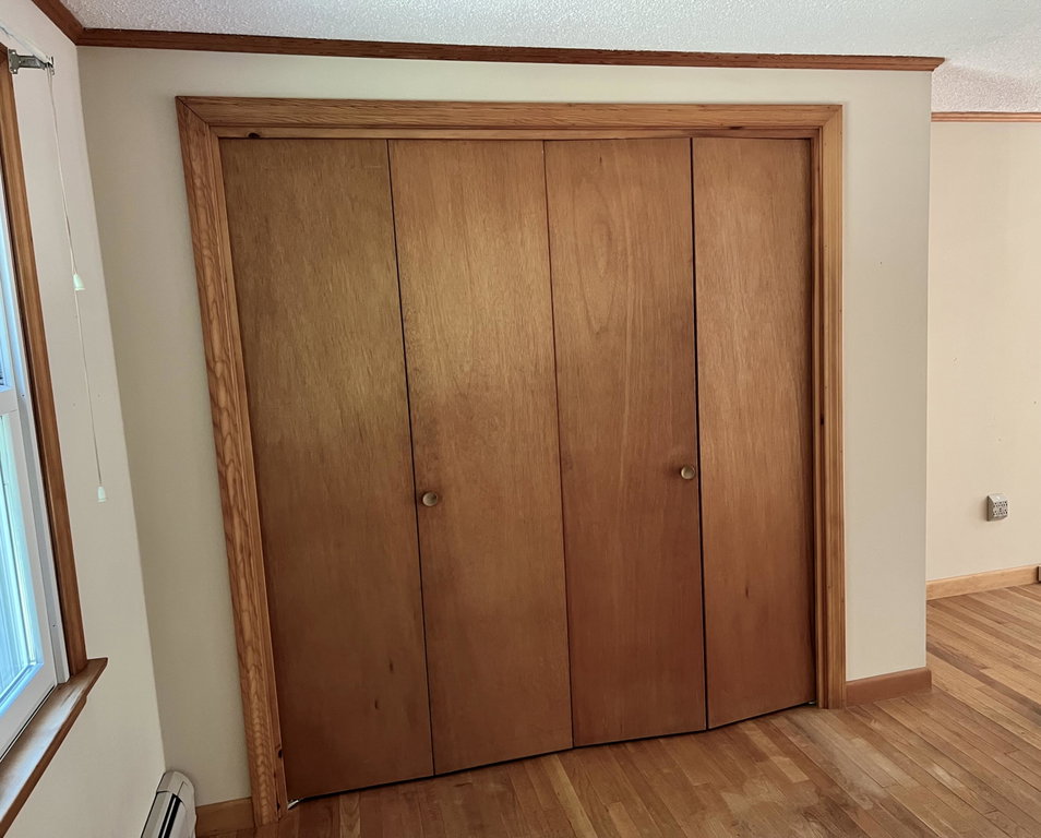 Closet in first floor primary bedroom