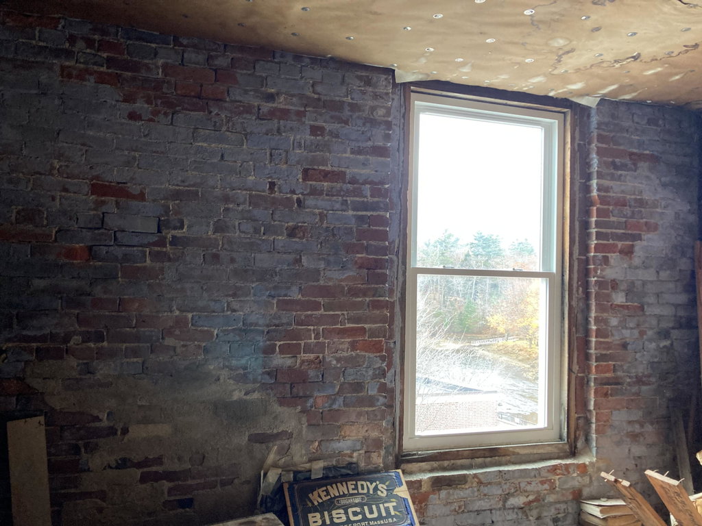South face brick wall.