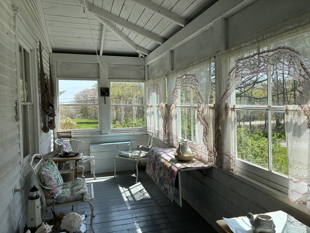 Glassed in porch off living room.