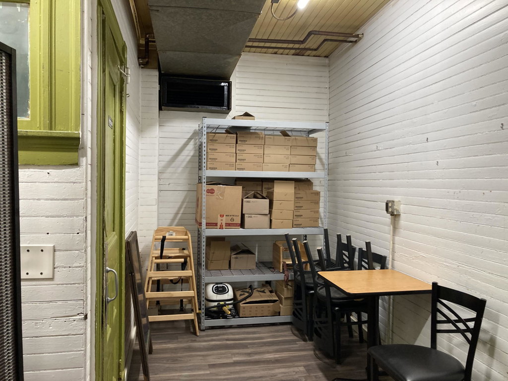 Restaurant storage area & 1/2 bath.