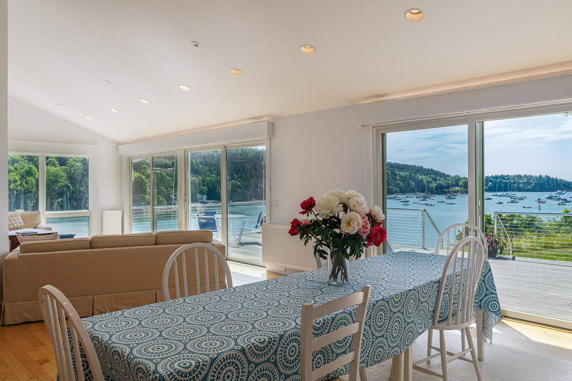 Dining area with doors to the deck