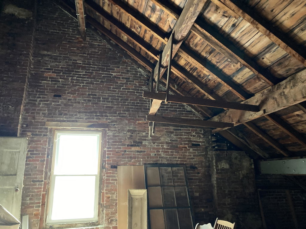 Attic roof structure & south window.