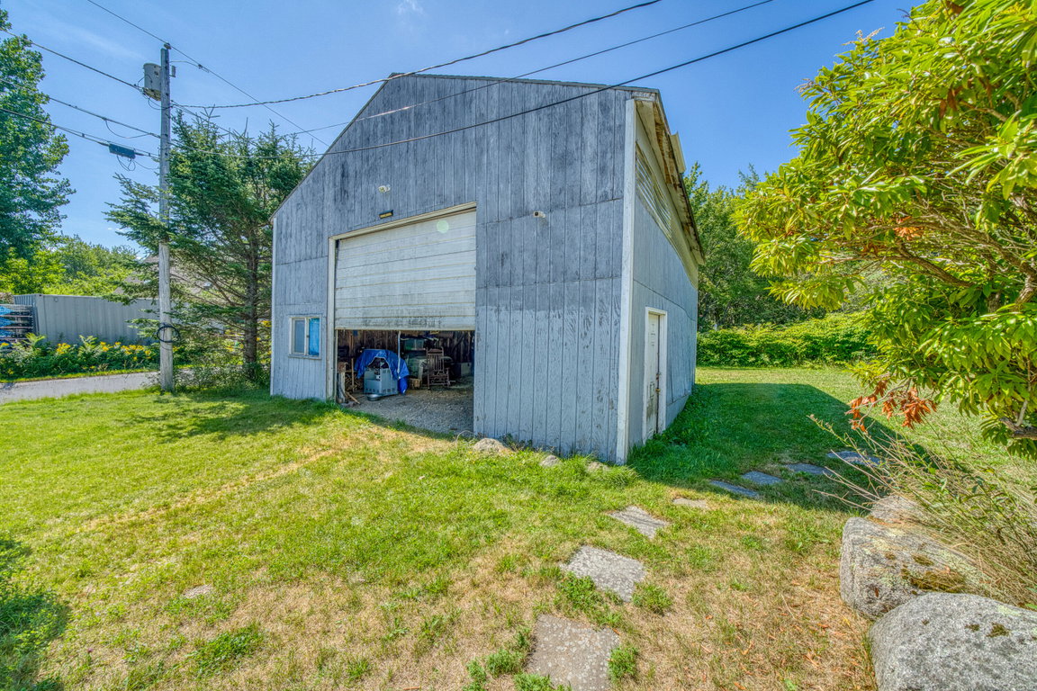 Large storage barn with tall door