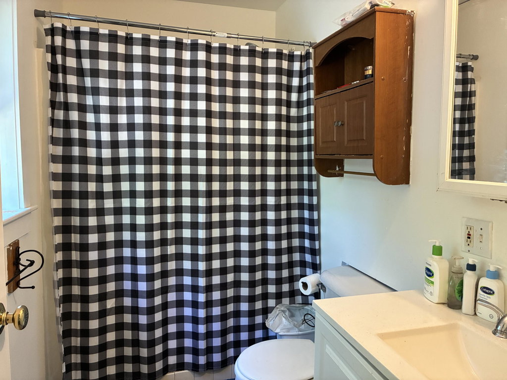 Full bath, primary bedroom.