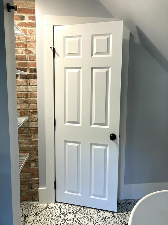 Linen closet in bathroom.