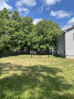 Looking towards fenced in yard