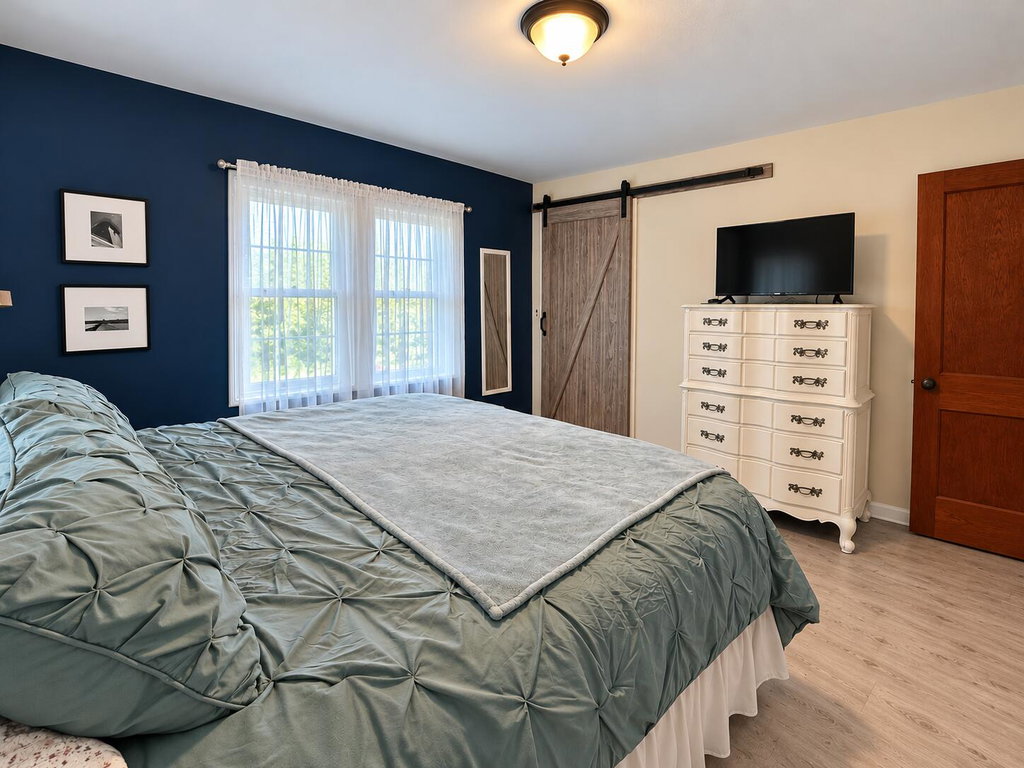 Cozy Farmhouse Bedroom with Barn Door