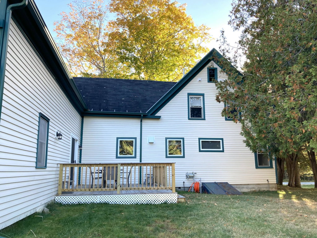 Back deck with views of field.