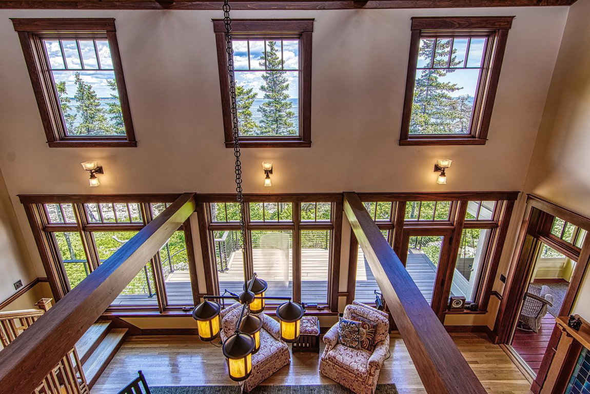 2nd floor looking down at main living ro