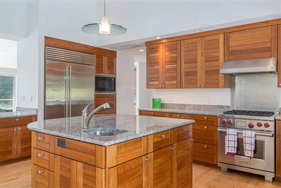 Cherry cabinets, granite countertops