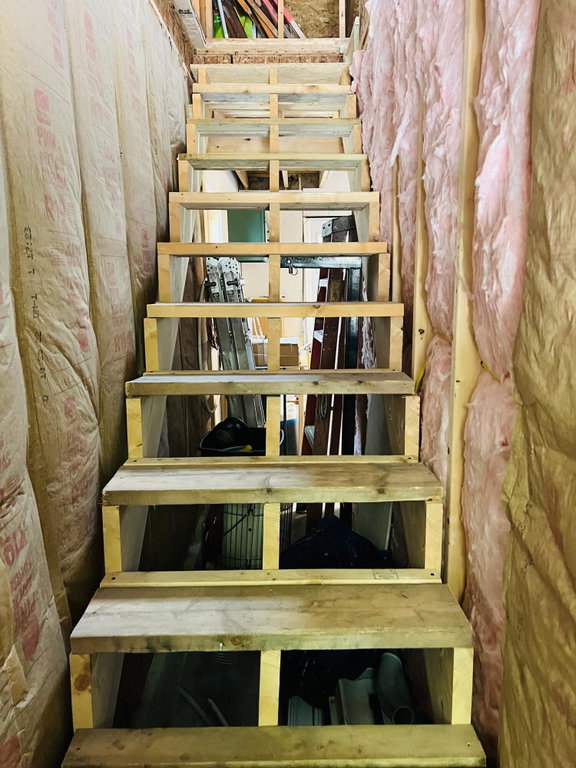 Stairs to space above garage