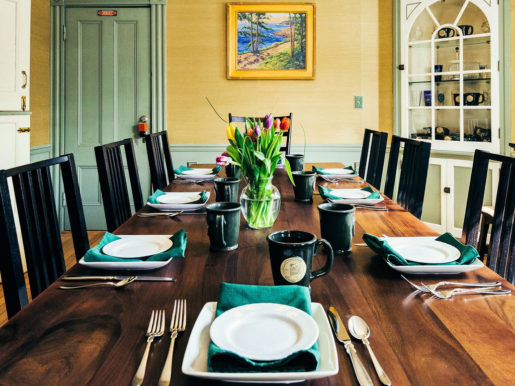 Dining room with table set for breakfast