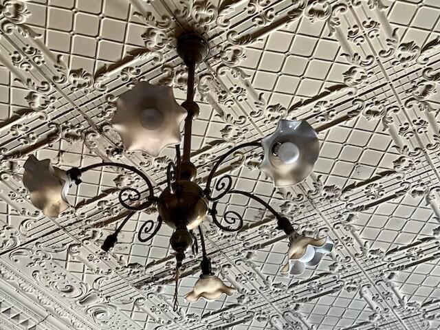 Original light fixture in ballroom.