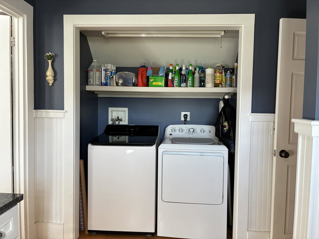 Laundry room off kitchen.