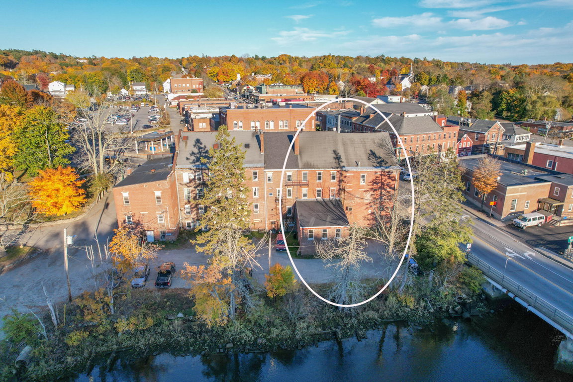 Buildings from air, river.