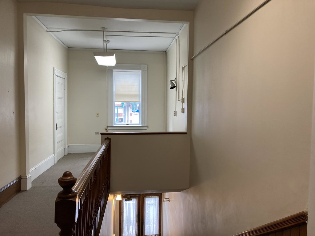 Stairway to 2nd floor offices.