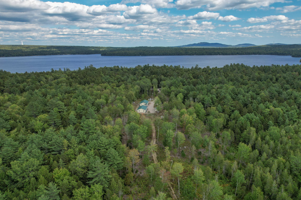 Aerial with pond in distance