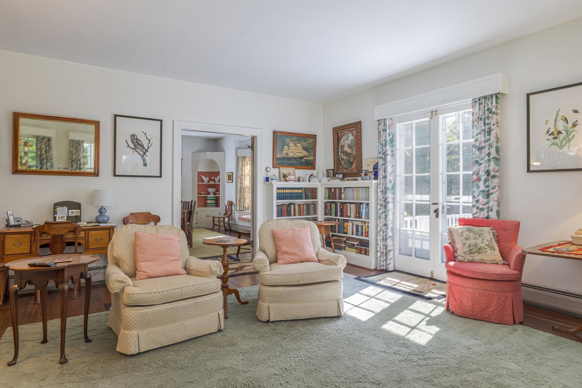 Living room with doors to porch
